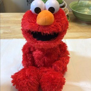 Sesame Street lovable huggable singing Elmo Etc